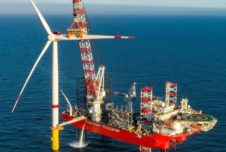 Oil rigs with wind turbines