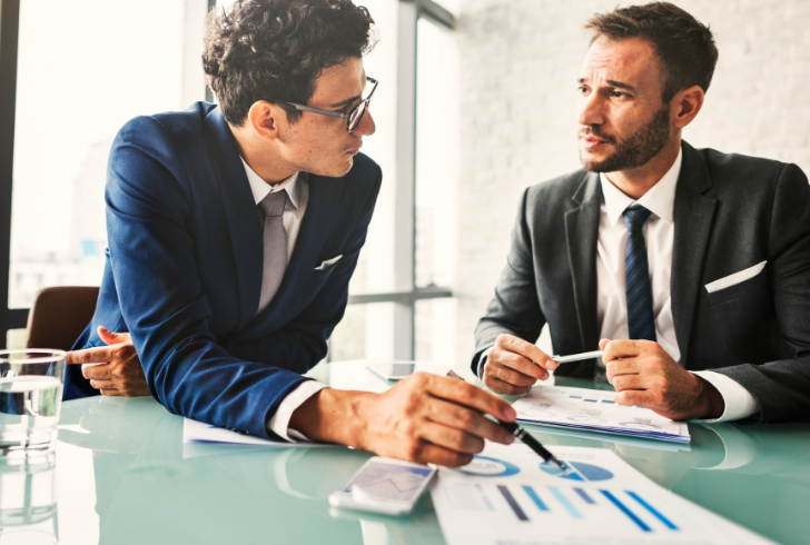 Investment bankers review transaction fee structure