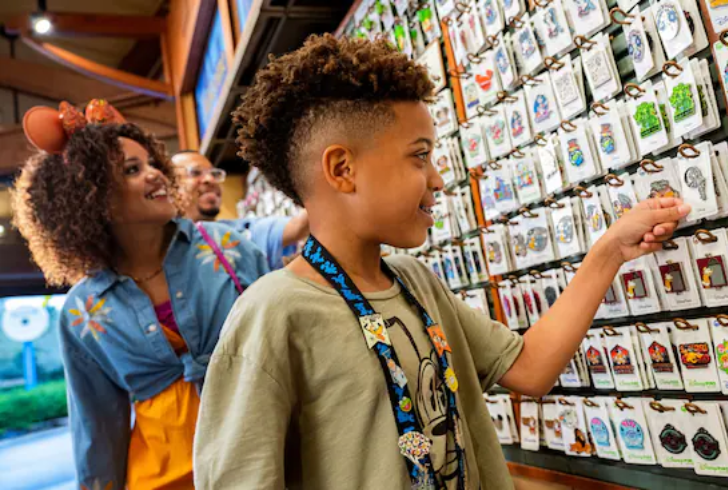 Mother and son browsing Disney pins together